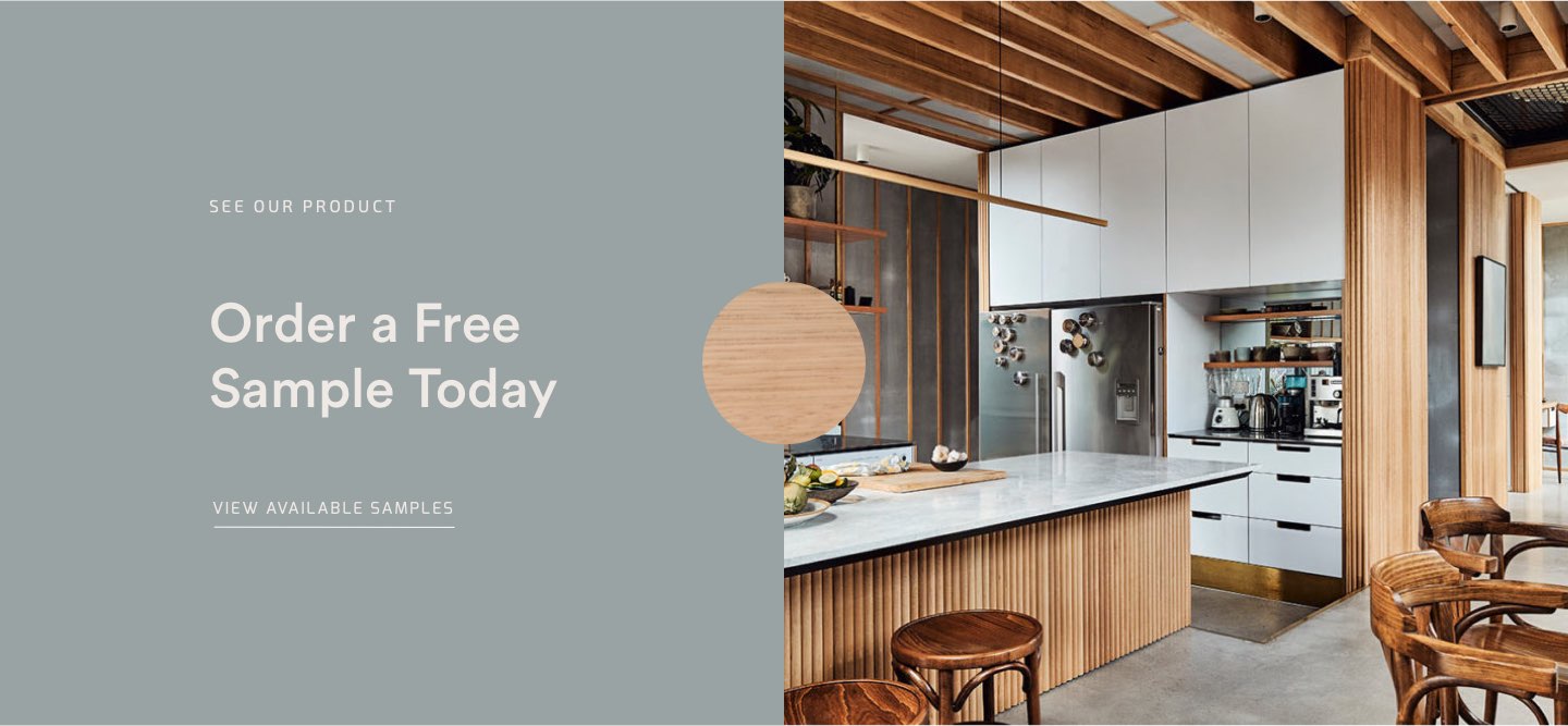 A kitchen area with lots of timber panelling and timber beams on the ceiling